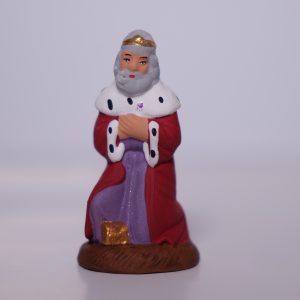 Roi mage blanc à genoux