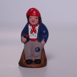 Homme à la pipe assis