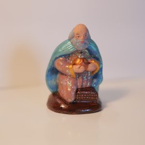 Roi mage à genou